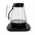 Smart glass kettle with app and voice control on white background